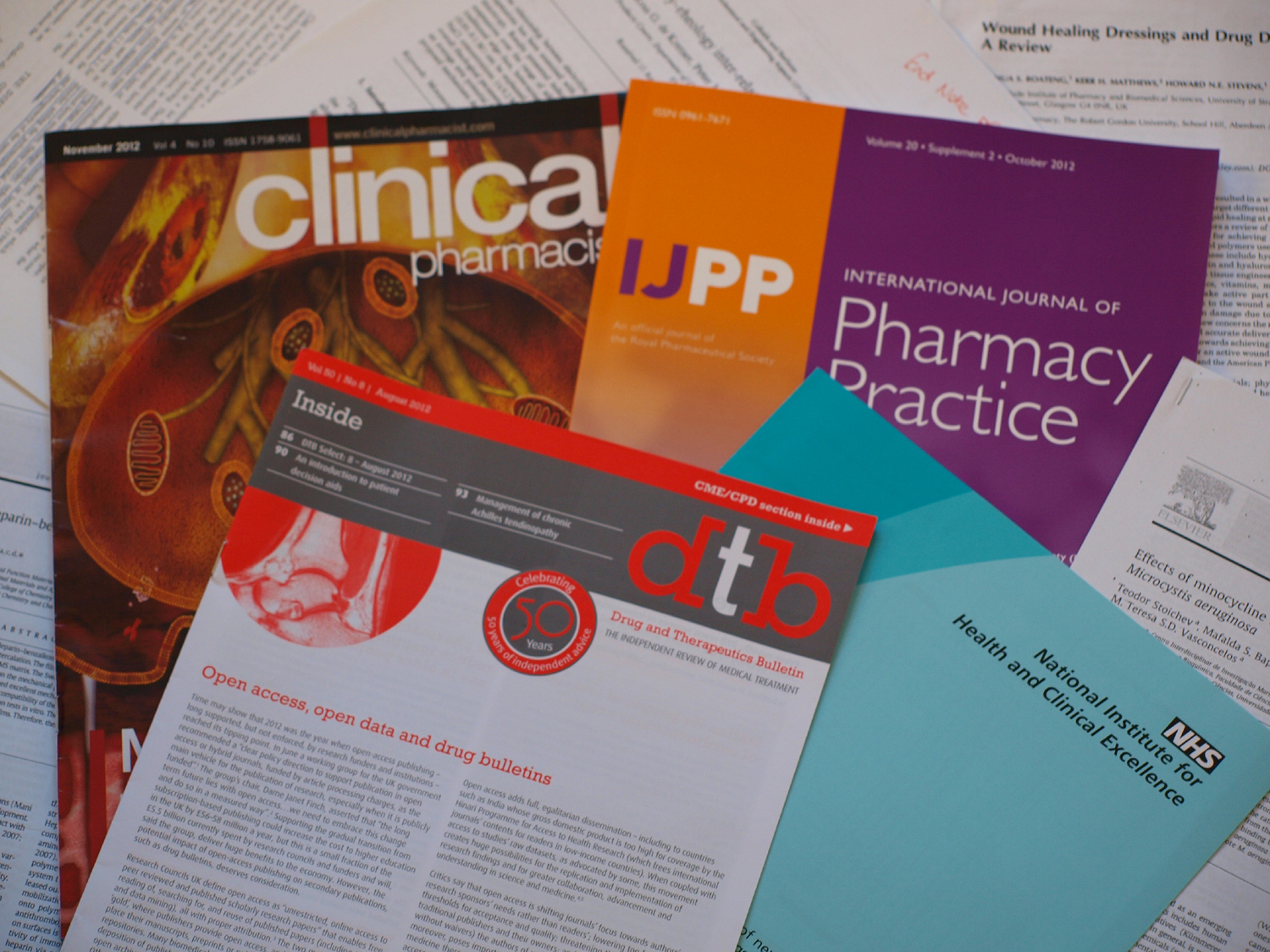 Photograph of research journal front covers and articles